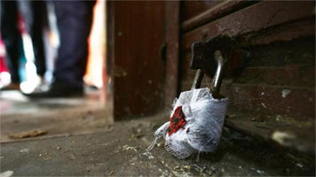 MC Sopore seals 3 shops over non-payment of rent