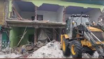 Commercial structure of former minister demolished in Shopian