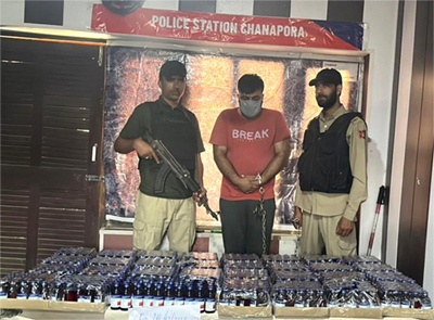 Srinagar police has arrested a drug peddler along with 800 bottles of banned Codeine phosphate Syrups