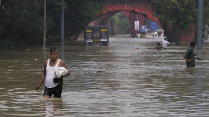 New Delhi races to open jammed flood gates as river surge halts India’s capital